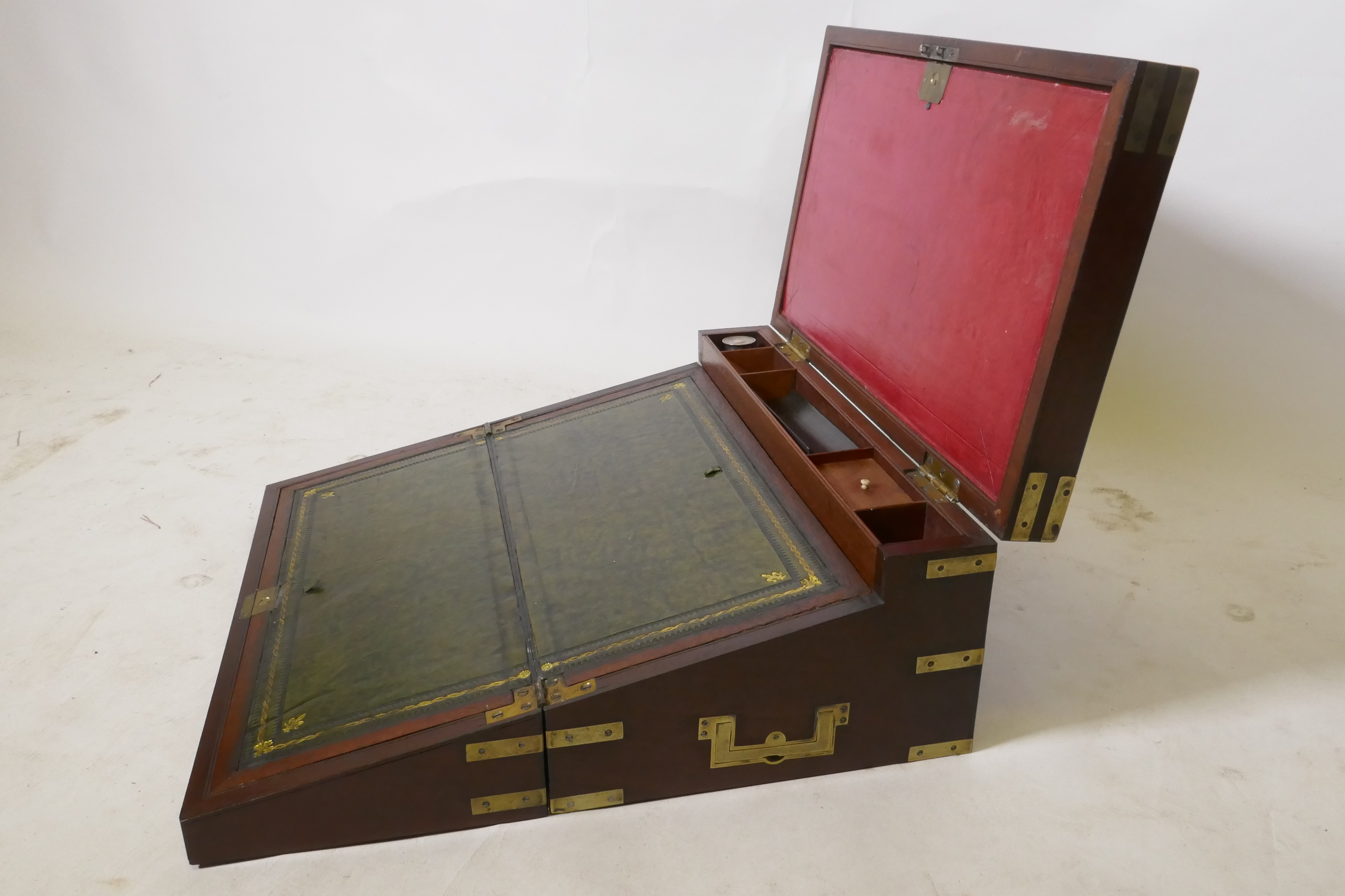 A C19th mahogany campaign writing slope with brass mounts and military style carrying handles, the - Image 5 of 8