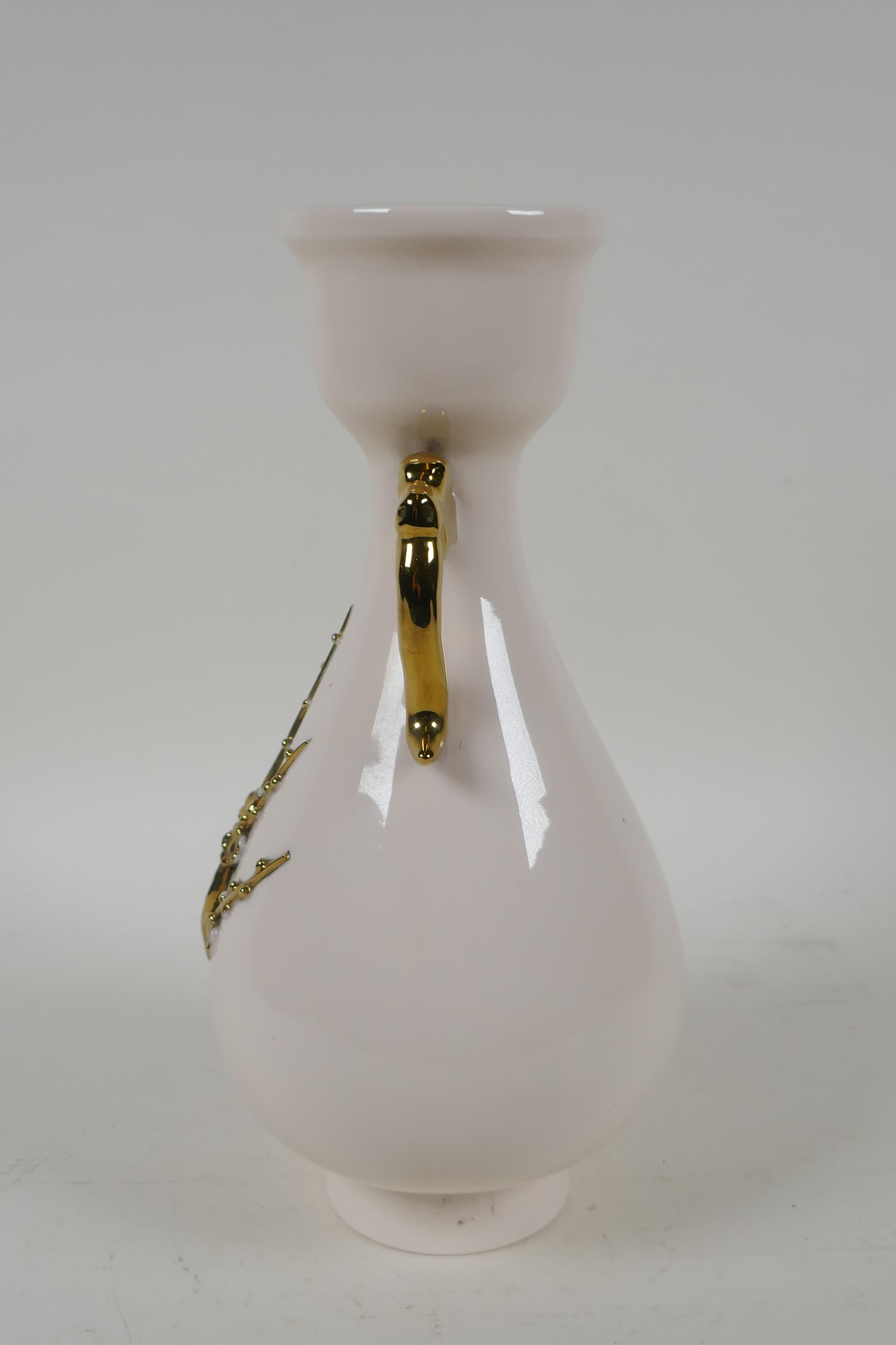 A Chinese blanc de chine porcelain two handled vase, with raised prunus blossom decoration picked - Image 2 of 6