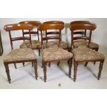 A set of six mahogany bar back dining chairs raised on turned supports