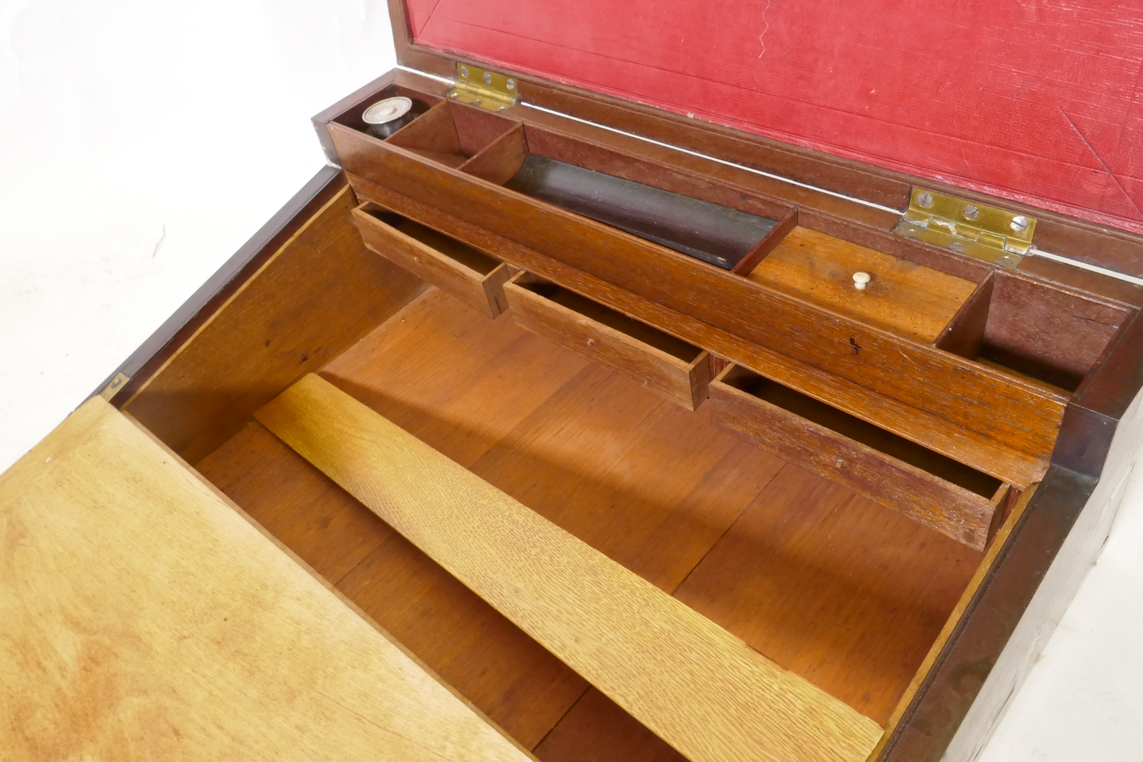 A C19th mahogany campaign writing slope with brass mounts and military style carrying handles, the - Image 6 of 8
