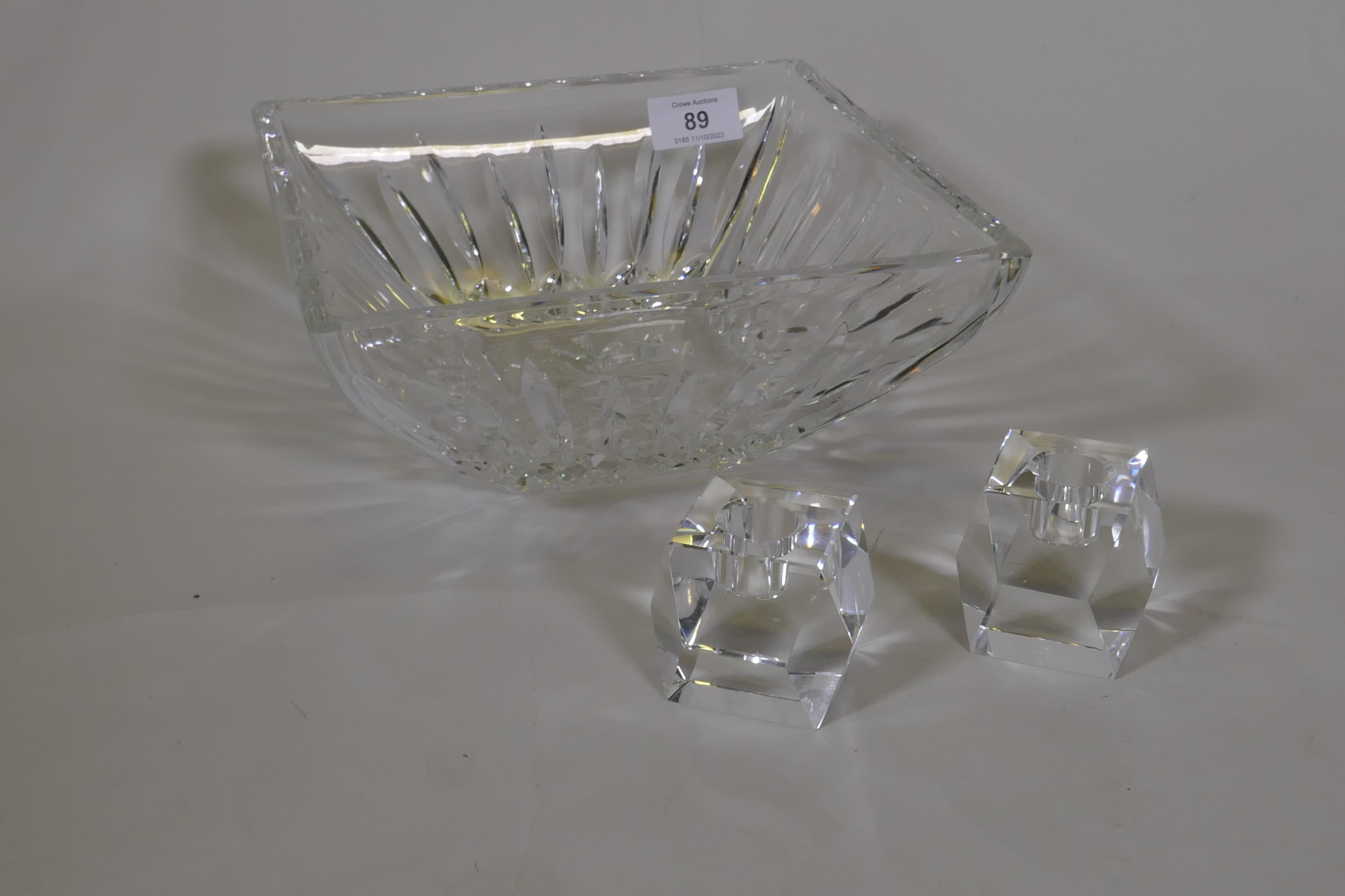 A Waterford crystal cut glass bowl, 23 x 23cm and a pair of Rosenthal glass candle holders