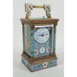 A brass and cloisonne repeater mantel clock, the enamel dials with Roman and Arabic numerals, 18cm