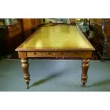 A large C19th eight drawer mahogany partners library table/desk, with leather inset top, raised on