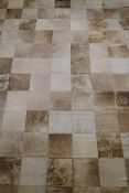 A John Lewis cowhide tile carpet, 240 x 170cm