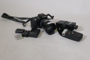 Olympus E500 digital camera with flash units and battery pack