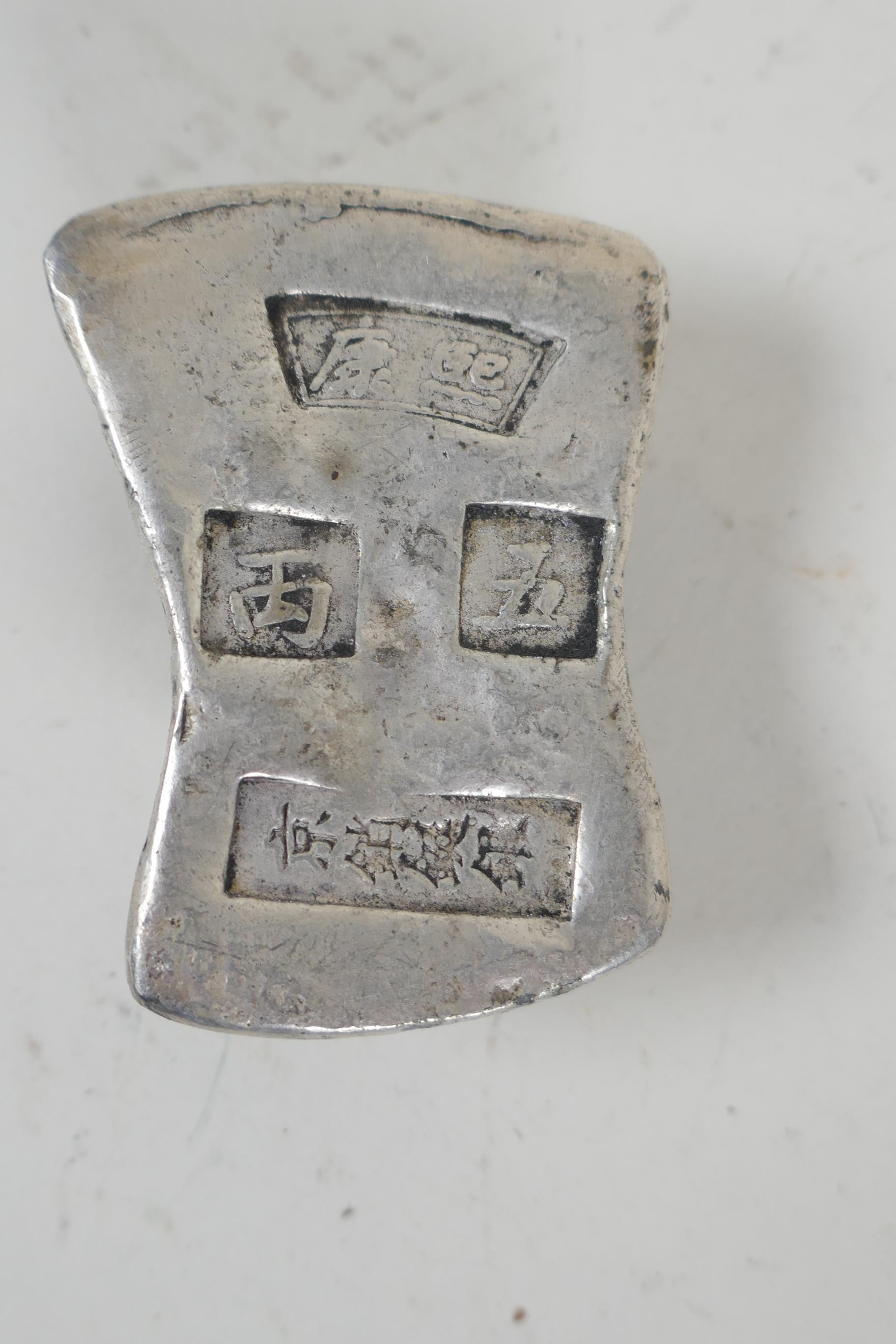 A Chinese white metal trade token/ingot, and another smaller, 10 x 8cm - Image 5 of 5