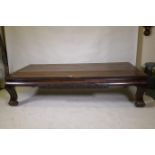 An antique Chinese soft-wood opium bed, with carved decoration, 198 x 94cm 47cm high