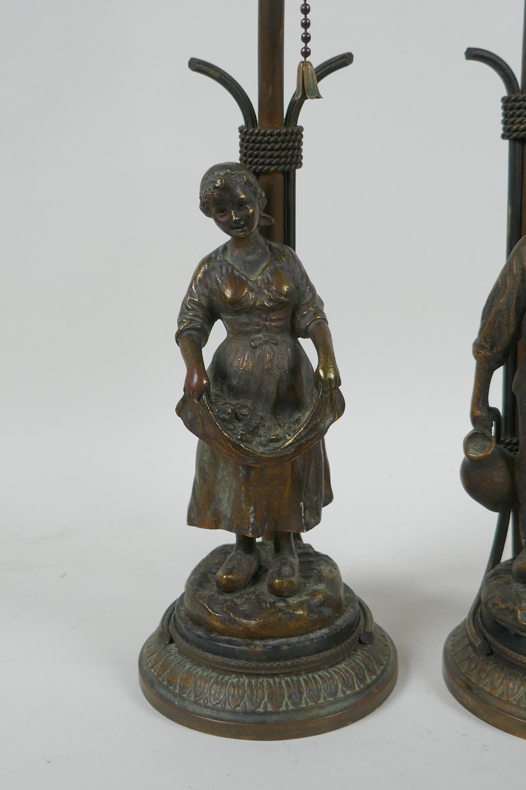 A pair of Dutch gilt bronze figural table lamps of farm workers, after Joseph D'Aste, (1881-1945), - Image 5 of 5