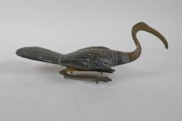 An oriental carved soapstone Ibis, with metal legs, 27cm long, AF
