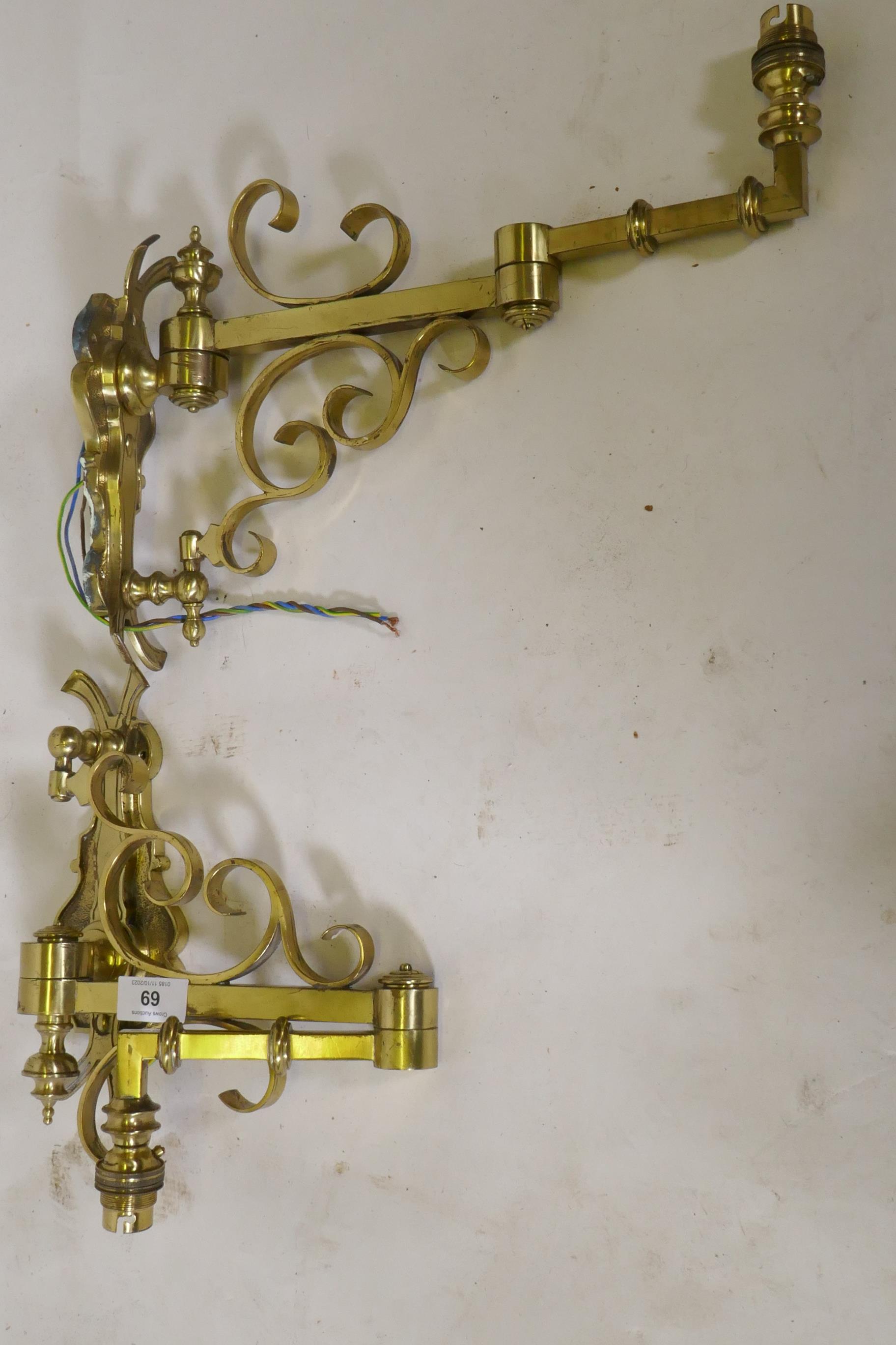 A pair of brass two fold wall sconces, 25cm high, 36cm extended - Image 2 of 3
