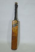 A Slazenger cricket bat, signed with players autographs, Pakistan 1971, Derbyshire, Surrey,
