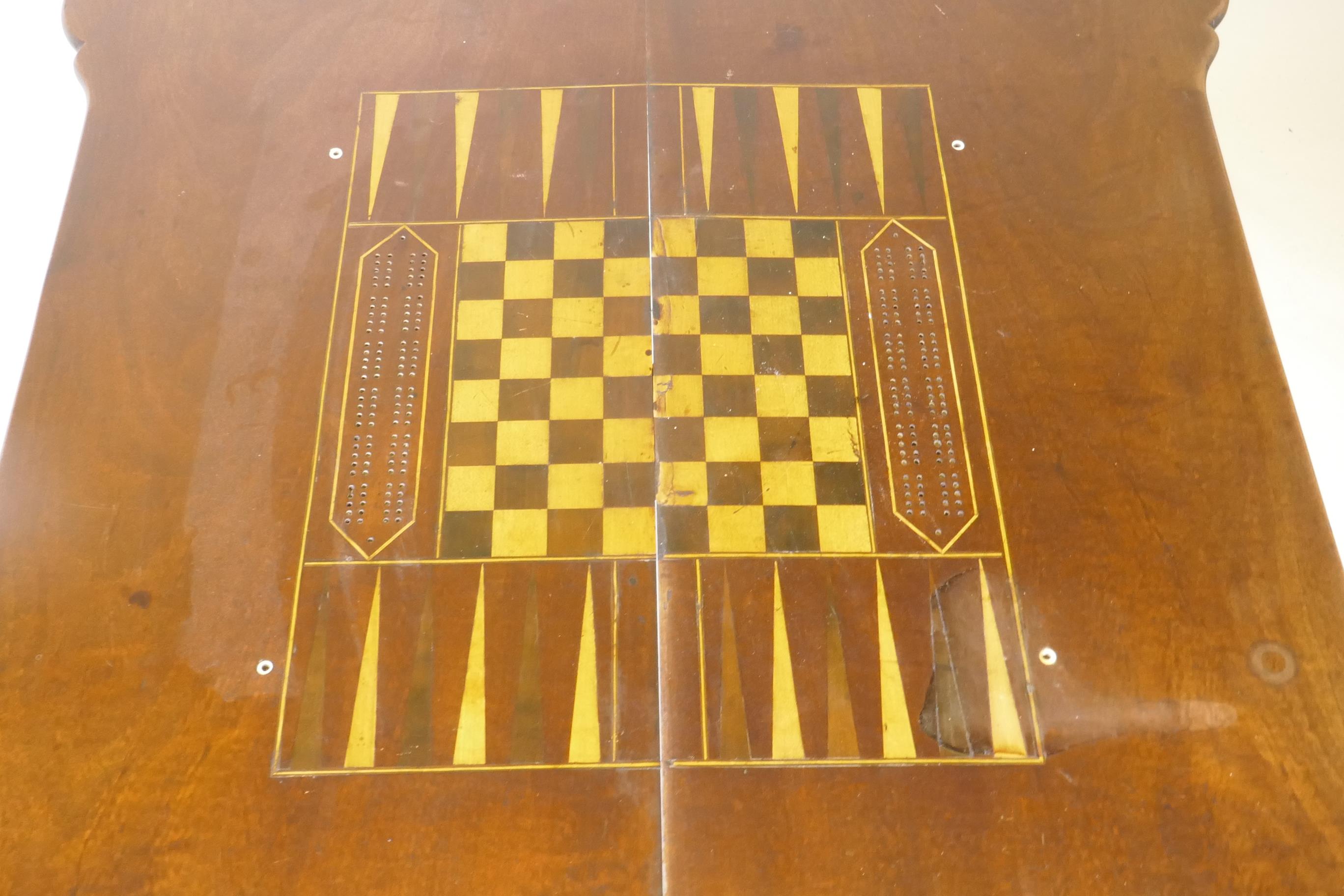 A Georgian mahogany fold over tea table with inlaid games top, shaped top and frieze drawer, - Image 4 of 5