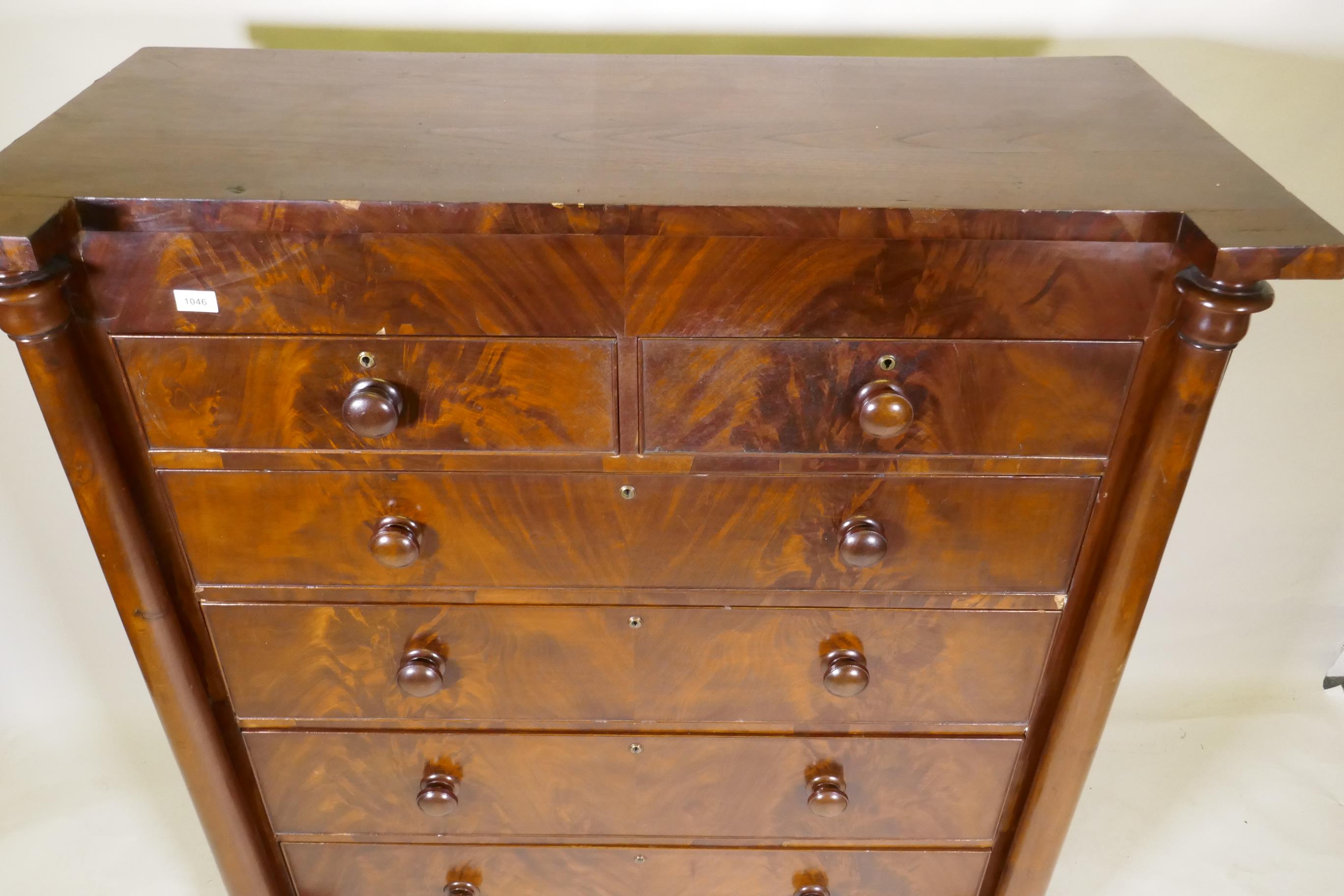A Victorian flame mahogany Scotch chest of two over four drawers, with cock beaded detail and - Image 3 of 4
