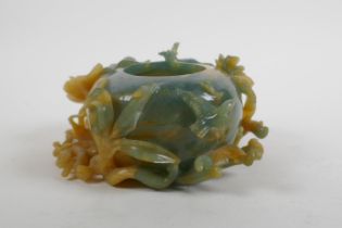 A Chinese bi colour jade pot decorated with birds and lotus flowers, AF, 16cm wide