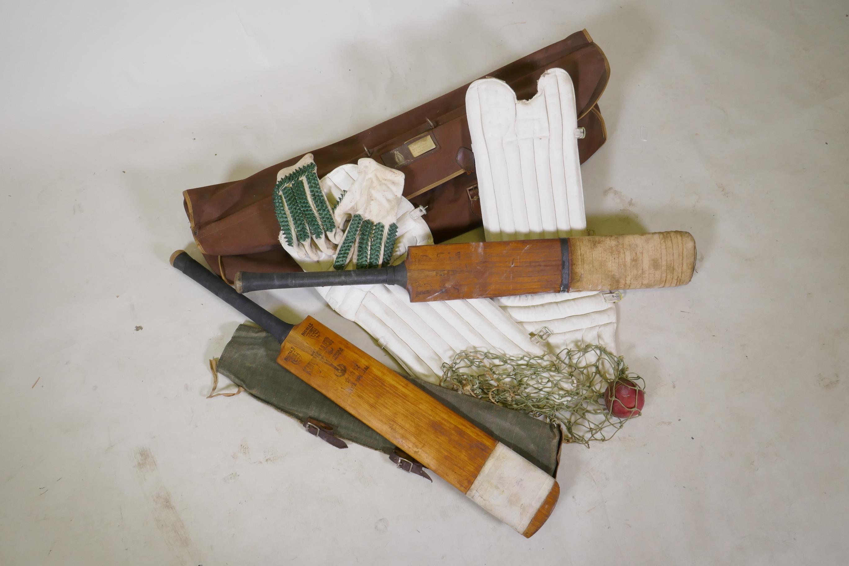 A collection of vintage cricket equipment to include two Keith Miller autograph bats, a set of pads, - Image 6 of 7