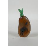 A Chinese antique agate snuff bottle decorated with a monkey and deer, with later hardstone stopper,