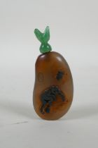 A Chinese antique agate snuff bottle decorated with a monkey and deer, with later hardstone stopper,