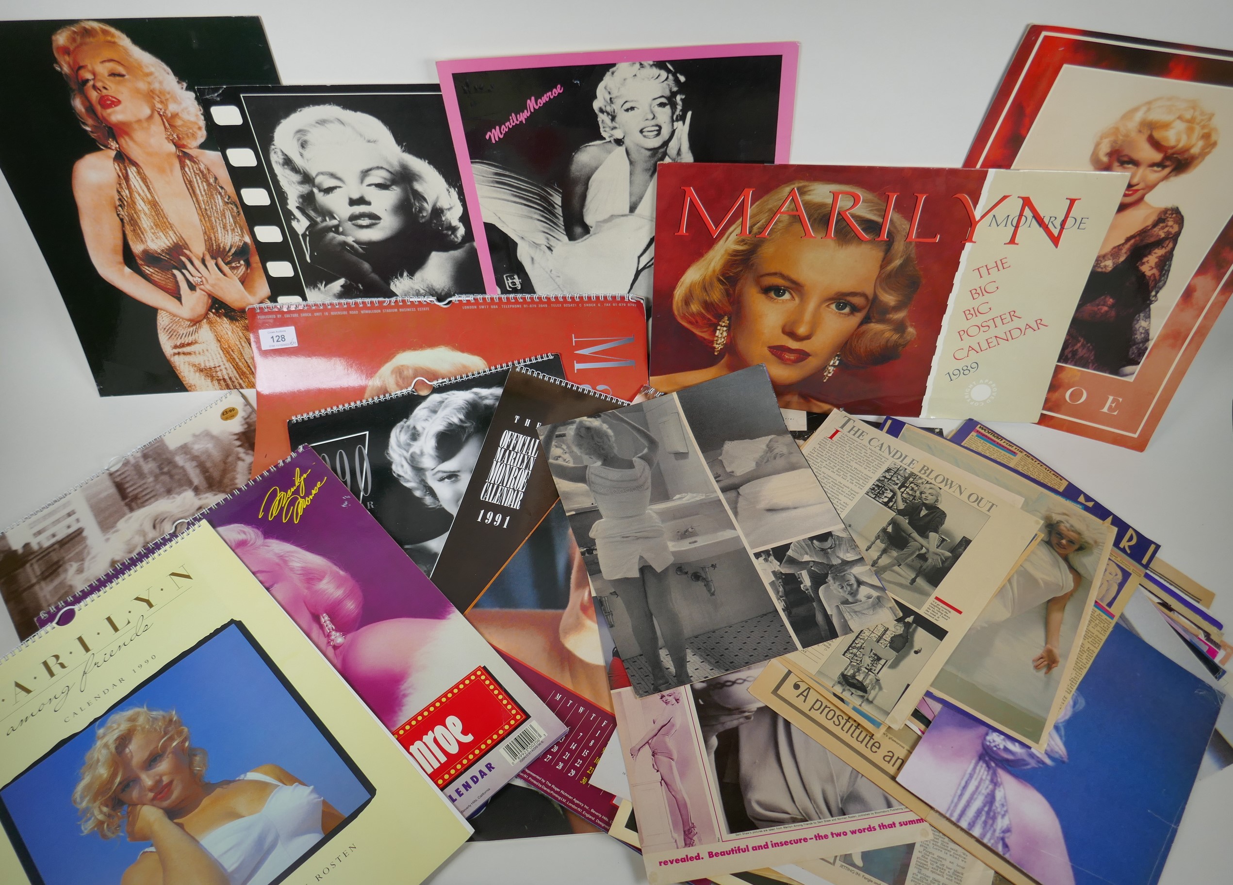 A large quantity of Marilyn Monroe ephemera to include calendars, press cuttings and posters,