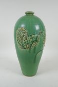 A Chinese celadon glazed porcelain vase with raised kylin decoration, 31cm high