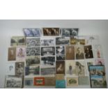 A quantity of early C20th and later postcards, and snapshot albums, mostly topographical, largest 17