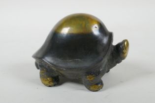 An oriental filled bronze tortoise, 7cm high