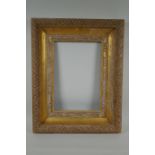 An C18th/C19th carved giltwood picture frame, requires some re-gilding, rebate 37 x 26cm