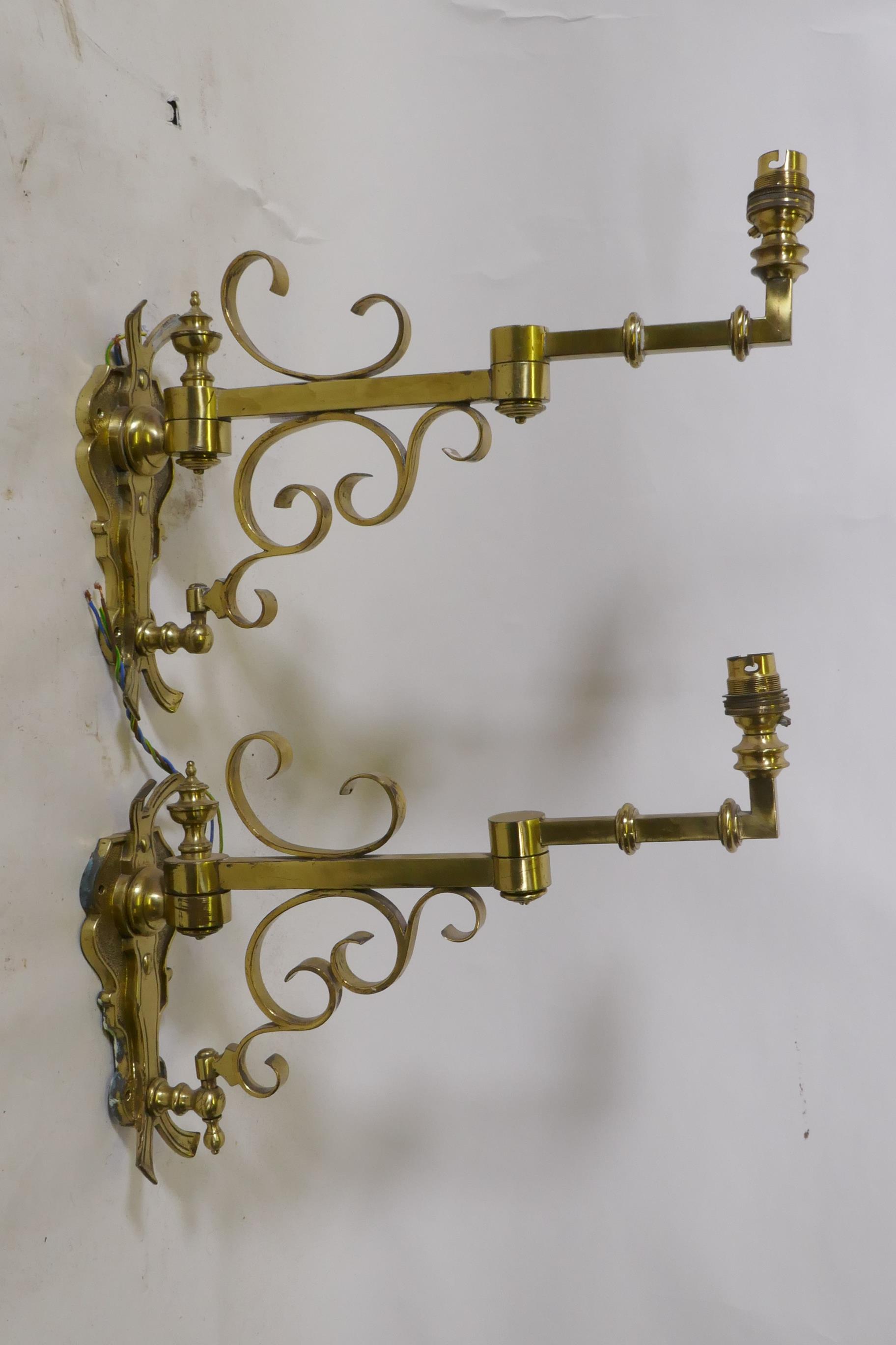 A pair of brass two fold wall sconces, 25cm high, 36cm extended - Image 3 of 3
