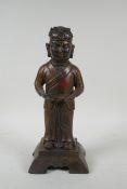 A Chinese gilt bronzed metal figure, 32cm high