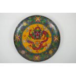 A Chinese cloisonne dish, with dragon and lotus flower decoration, the base decorated with bats