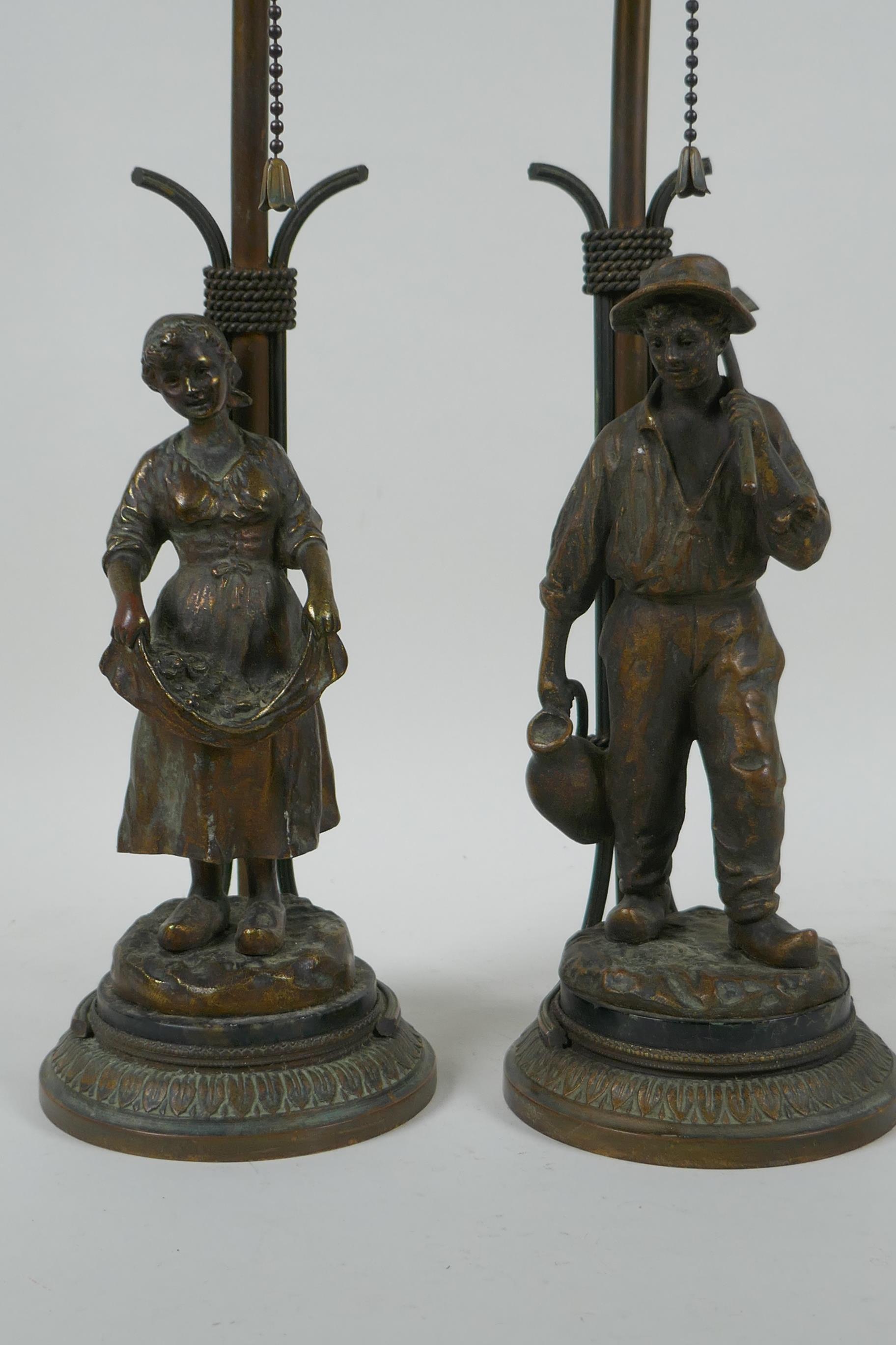 A pair of Dutch gilt bronze figural table lamps of farm workers, after Joseph D'Aste, (1881-1945), - Image 2 of 5