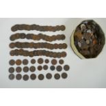 A large collection of assorted world coinage including a large quantity of Victorian copper pennies