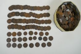 A large collection of assorted world coinage including a large quantity of Victorian copper pennies