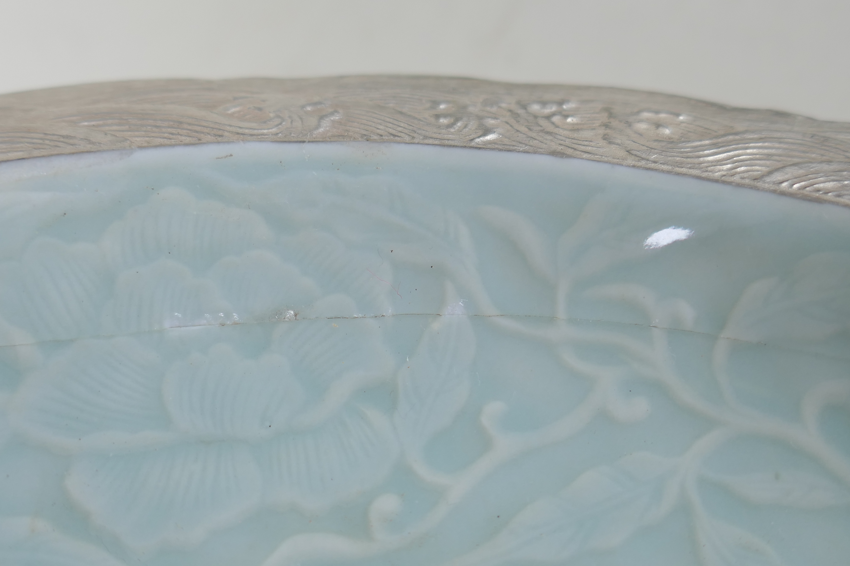 A Chinese celadon ground porcelain dish with lobed rim, and silver glazed details, decorated with - Image 4 of 6
