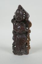 A Chinese carved soapstone figure, 15cm high