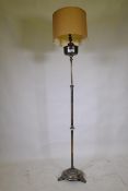 Antique silver plated telescopic floor oil lamp, converted to electricity, the back stamped EB.,