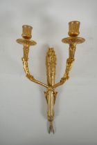 An ormolu two branch wall sconce in the form of an arrow quiver, 38cm high