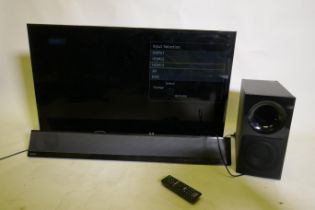 Panasonic TX-40DX600B 4K LDC TV, and a Sony SA-CT390 sound bar and sub woofer, AF, tv screen marked