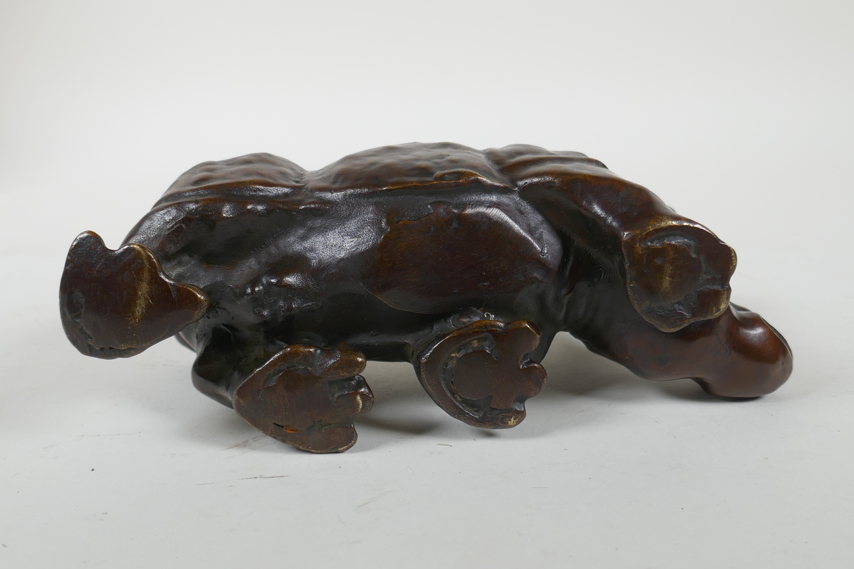 A filled bronze rhinoceros, 19cm long - Image 3 of 3