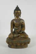 A Sino Tibetan cloisonne and gilt metal Buddha, 32cm high