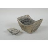 A Chinese white metal trade token/ingot, and another smaller, 10 x 8cm