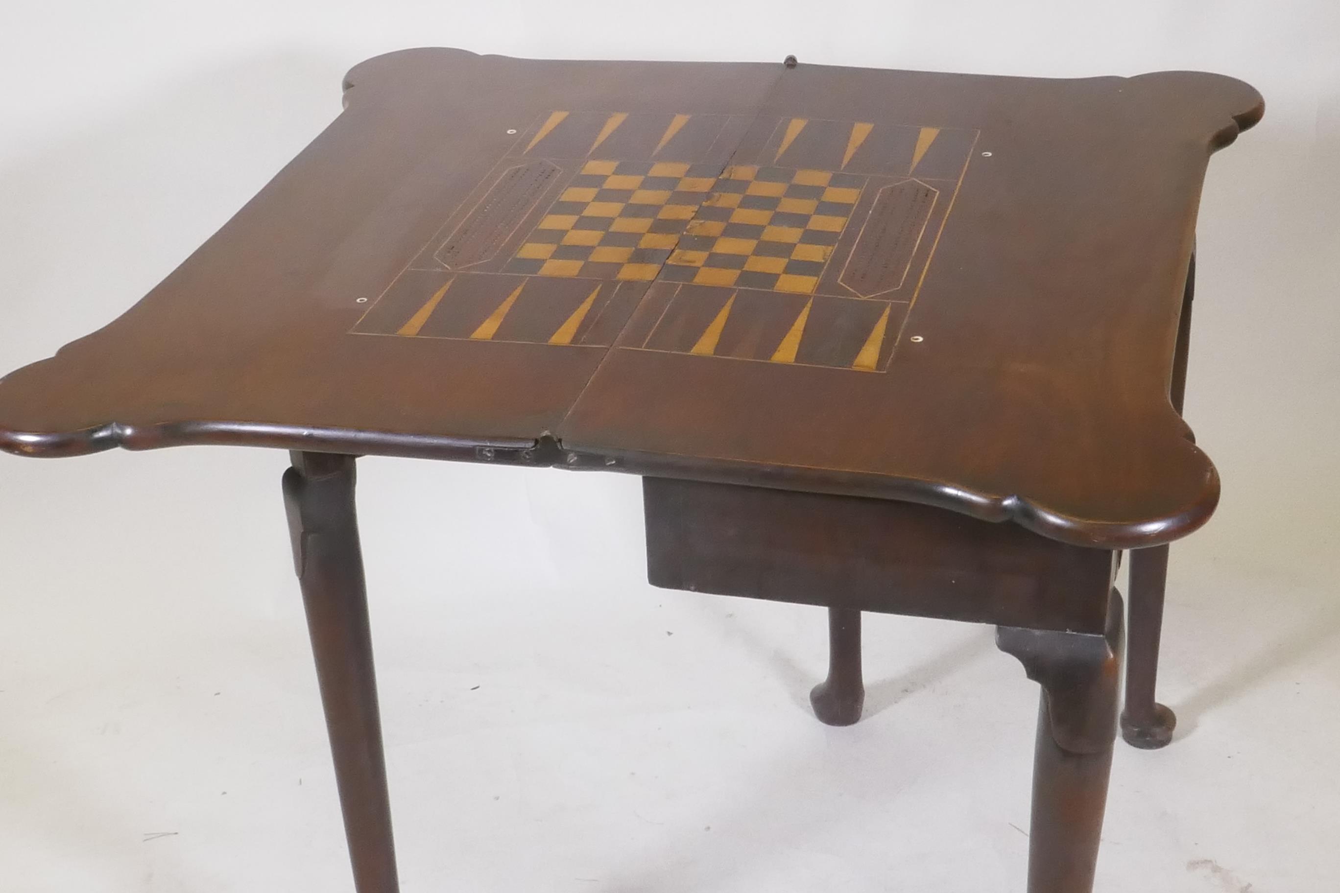 A Georgian mahogany fold over tea table with inlaid games top, shaped top and frieze drawer, - Image 3 of 5