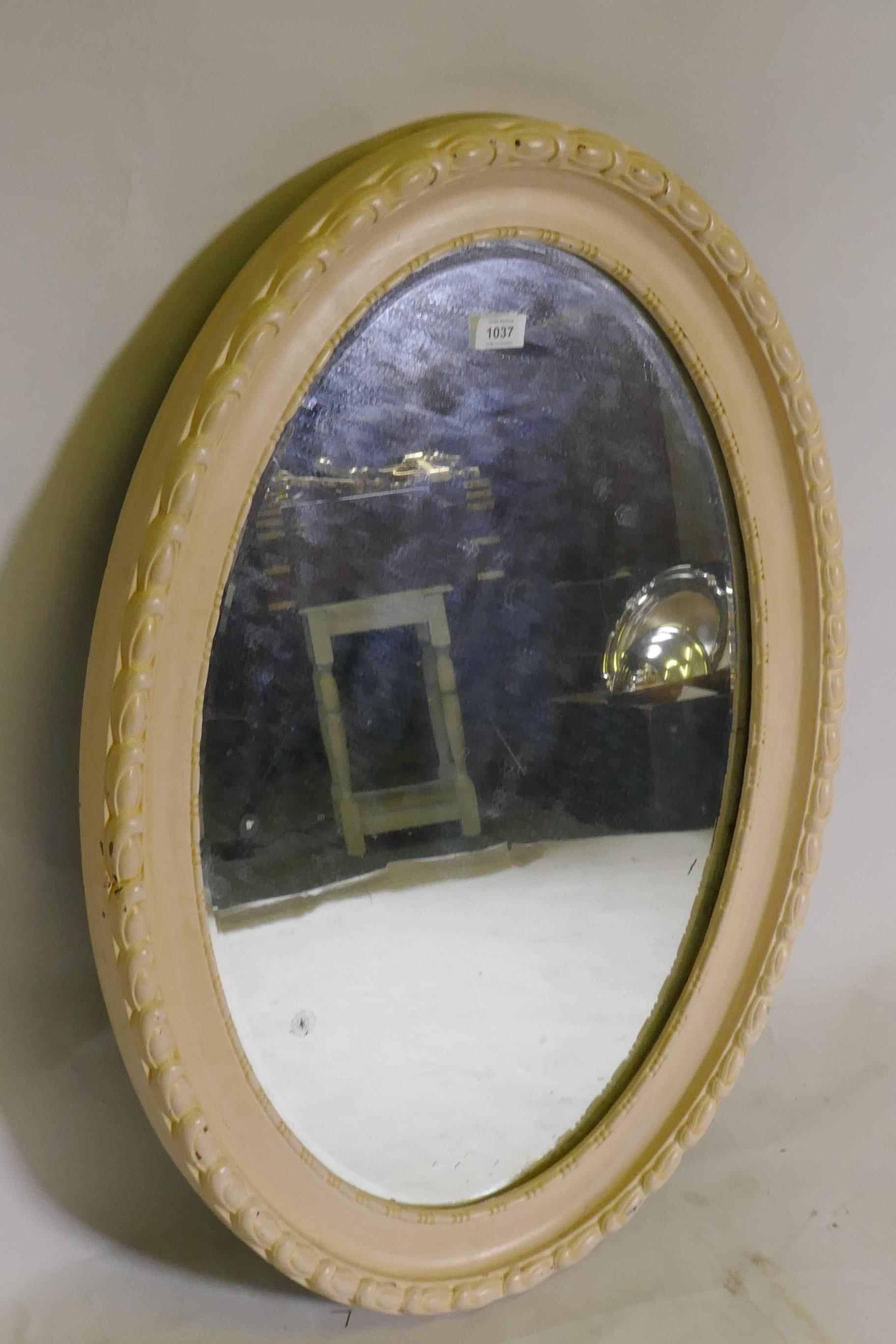 An antique painted wood and composition oval shaped wall mirror, 90 x 60cm - Image 2 of 2