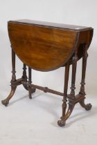 A fine C19th rosewood Sutherland table, raised on fluted tapering columns and swept supports with