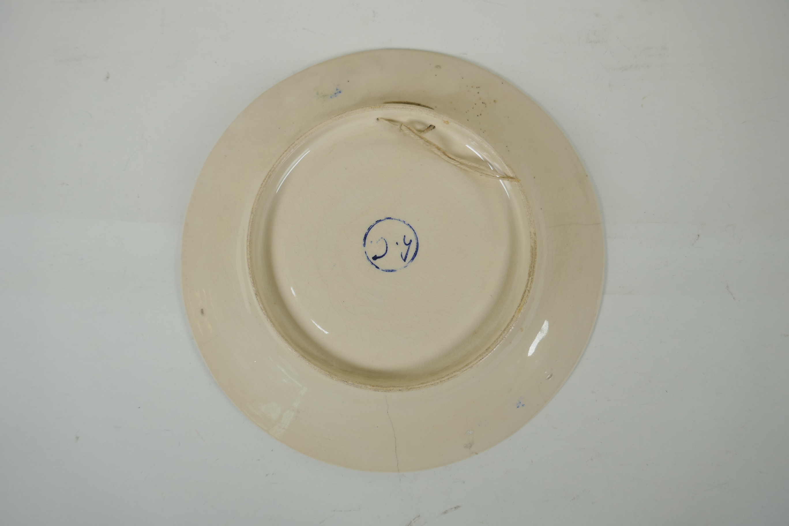 A polychrome Delft cabinet dish with floral decoration, mark to bae, AF, 25cm diameter - Image 3 of 6