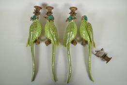Two pairs of polychrome porcelain and gilt metal parrot wall sconces, 47cm high, 1AF