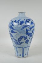 A Chinese blue and white porcelain meiping vase with phoenix and floral decoration, 31cm high