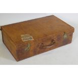 A vintage leather suitcase by Landsdowne, 23 Piccadilly, Jermyn St. SW