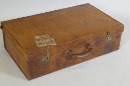 A vintage leather suitcase by Landsdowne, 23 Piccadilly, Jermyn St. SW