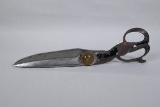 A pair of US made tailor's shears by R. Heinisch of Newark, New Jersey, in steel with brass cap,