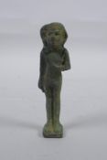 An Egyptian bronze figure, 11cm high